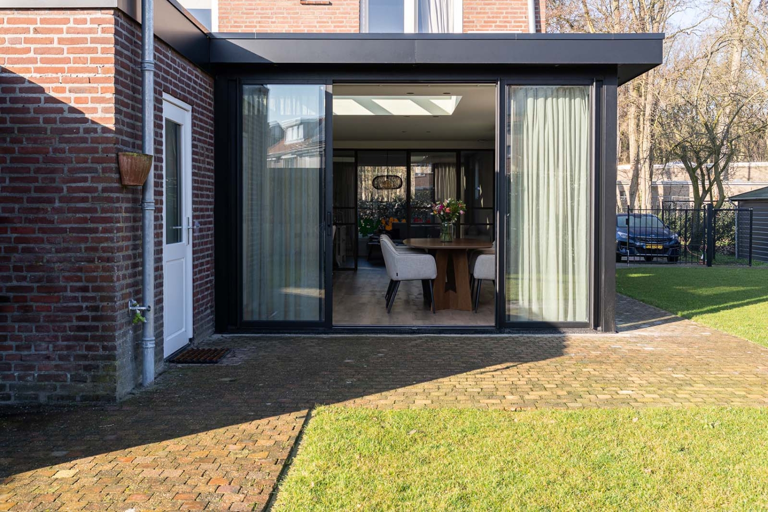 Serre uitbouw met aluminium schuifpui